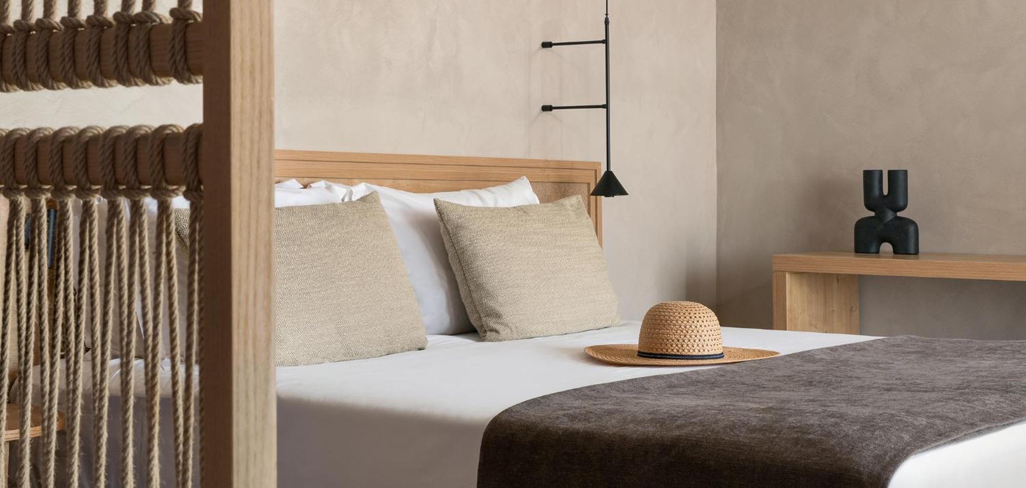 Helea Lifestyle Beach Resort Kallithéa Exterior foto A bed with a straw hat