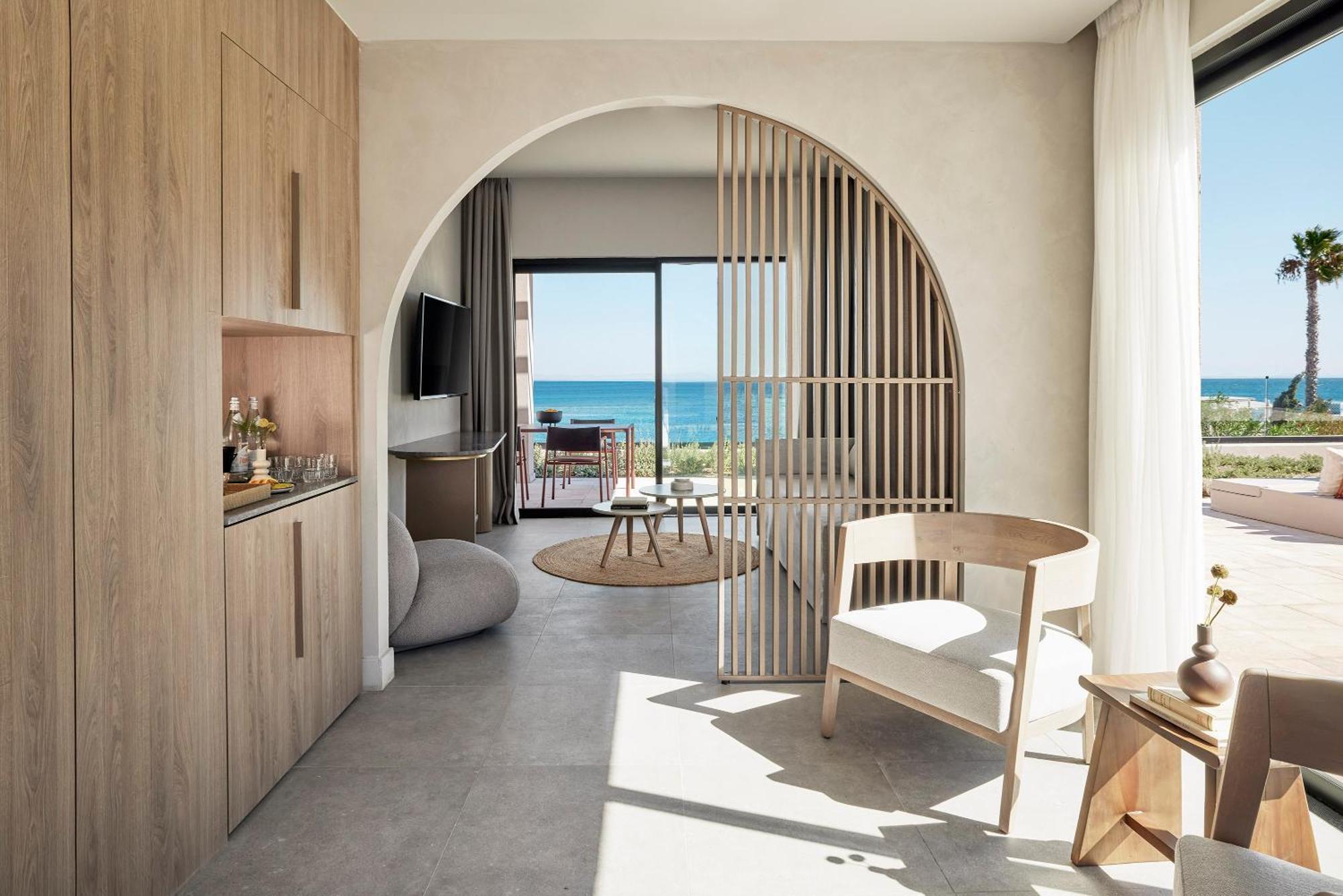 Helea Lifestyle Beach Resort Kallithéa Quarto foto Interior of a suite at the hotel